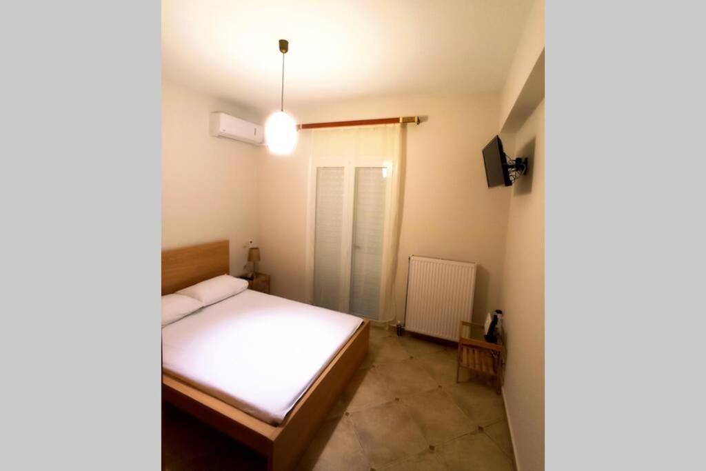Melina Apartment Порос Экстерьер фото