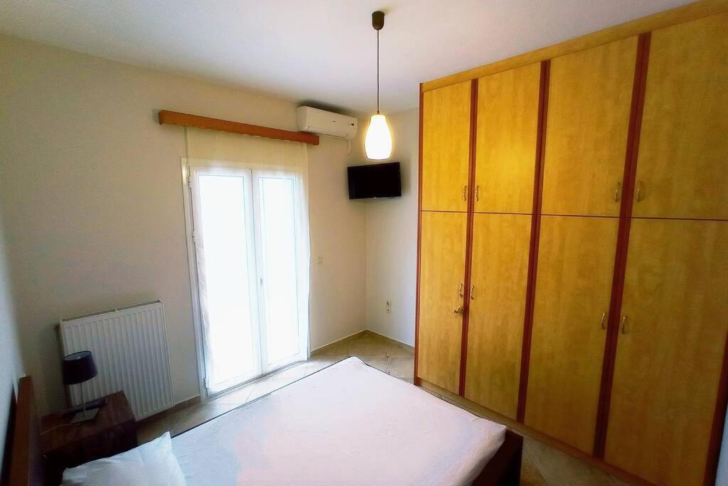 Melina Apartment Порос Экстерьер фото